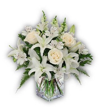 Arranjo de Condolências com Rosas, Lírios e Boca de Leão em vaso de vidro.